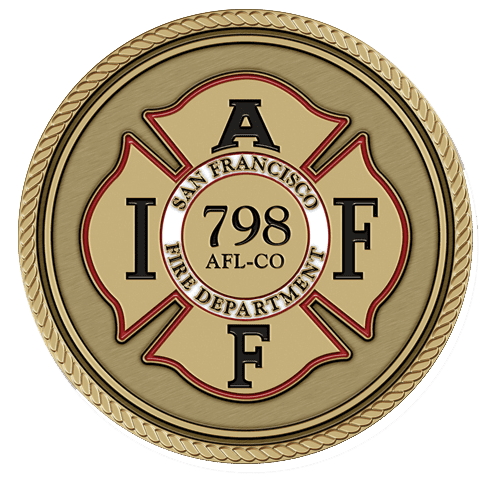 A gold and black fire department emblem