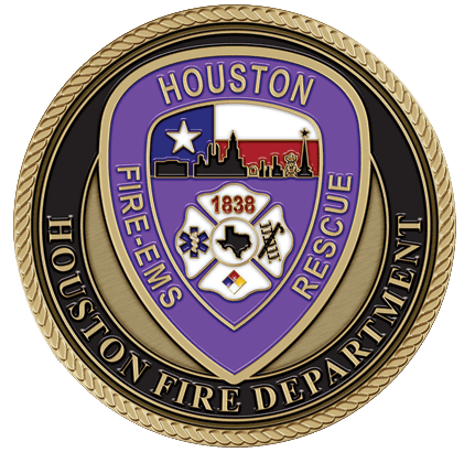 A purple and gold fire department patch on a green background.