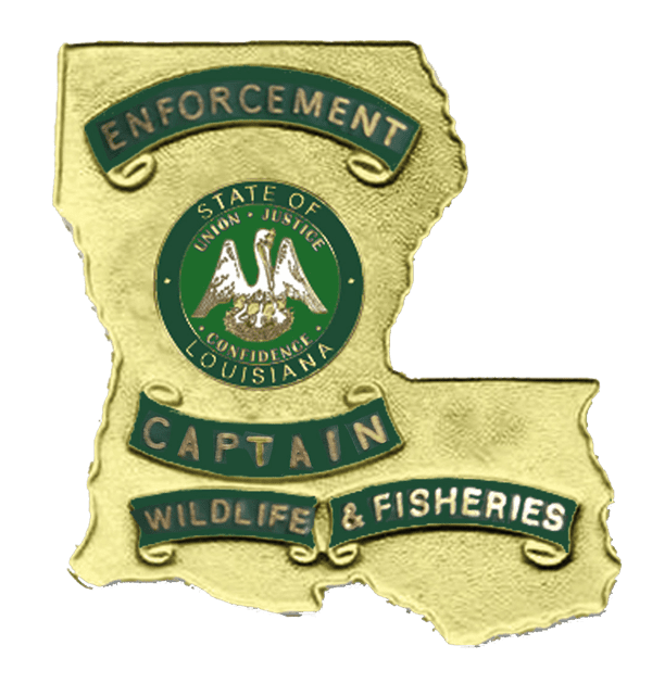 A badge that says enforcement, captain, wildlife and fisheries.