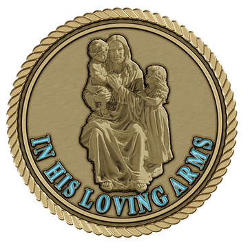 A gold medal with the words in his loving arms