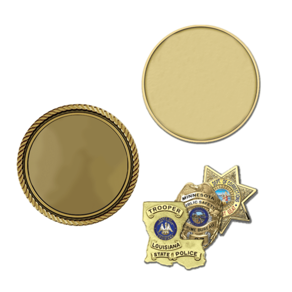 A set of three badges and two gold discs.