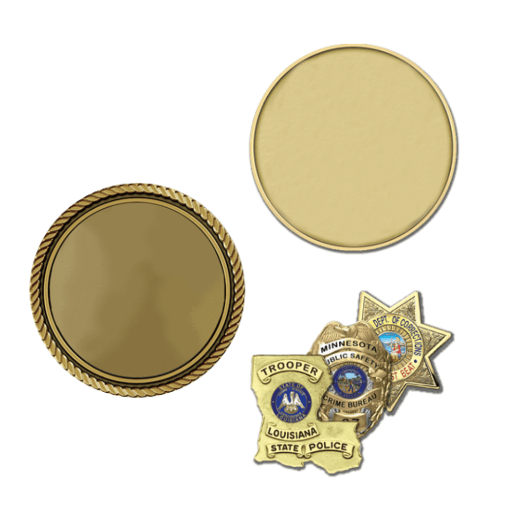 A set of three badges and two gold discs.