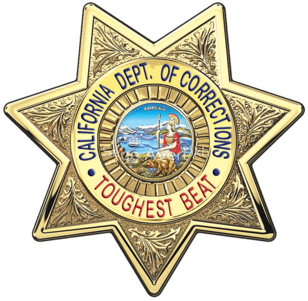 A badge of the california department of corrections