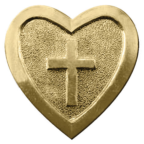 A gold heart with a cross on it.