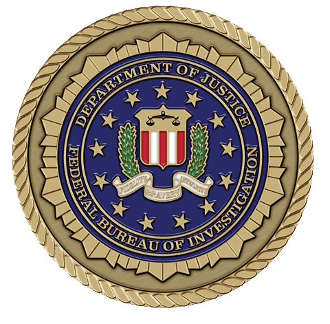 A gold seal with the fbi logo on it.