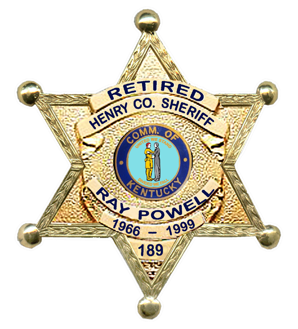 A badge that says retired henry county sheriff ray powell 1 9 6 5-1 9 9 3