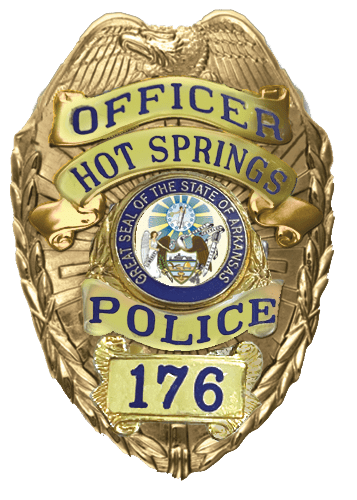 A badge of the officer hot springs police department.