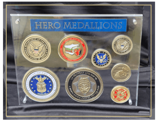 A display case with nine medals in it.