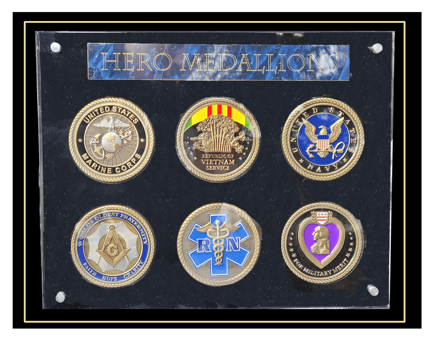 A display case with six different medals.