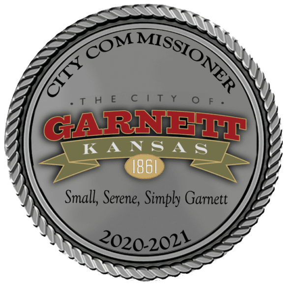 A seal that says city commissioner, garnett kansas.