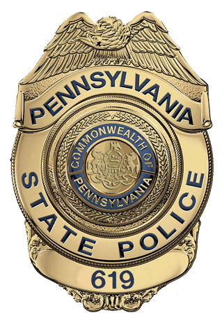 A pennsylvania state police badge is shown.