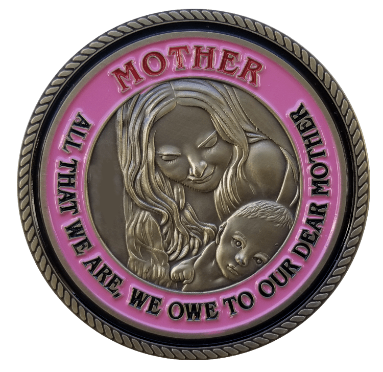 A pink and black plaque with the words mother all that we owe to our dear mother